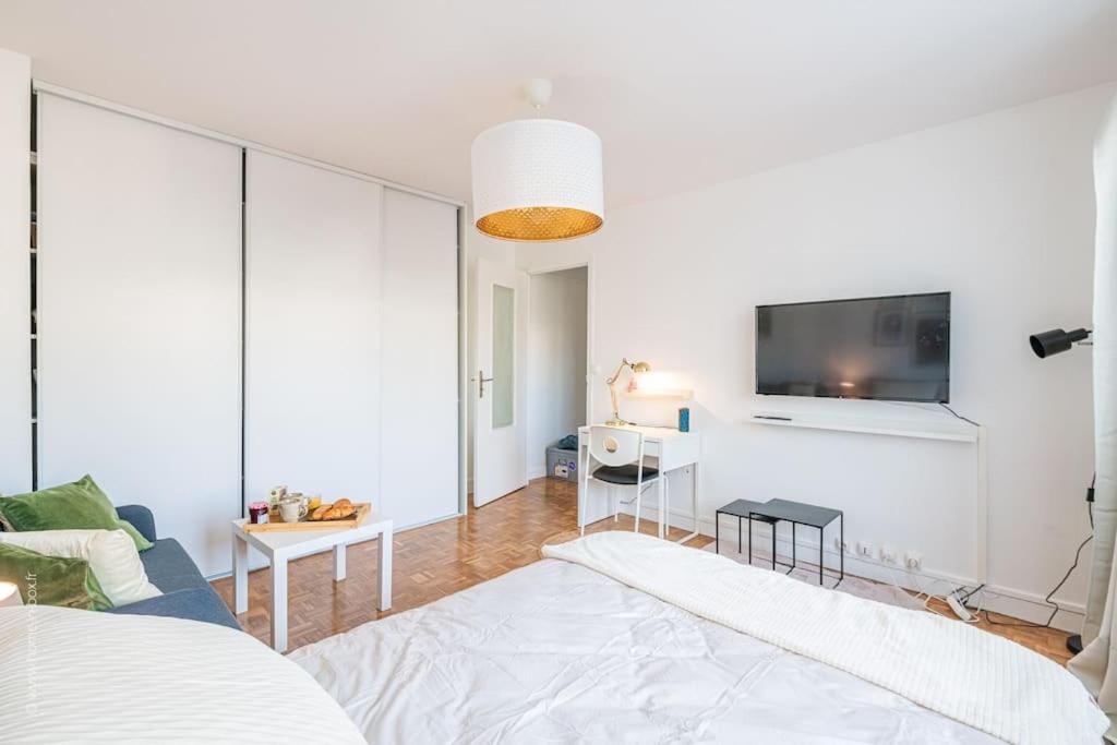 Appartement Suresnes : Appart cosy au pied de Paris La Defense Extérieur photo