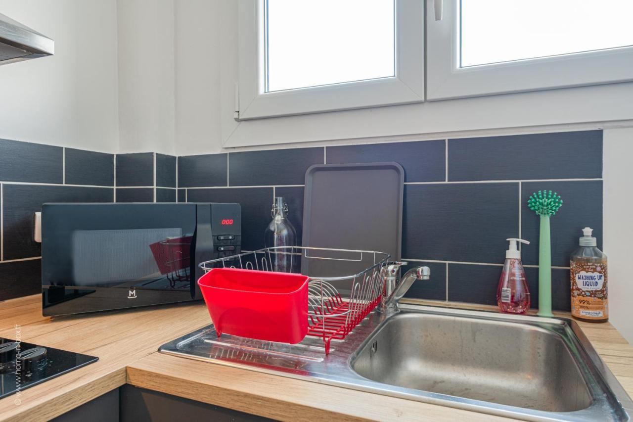 Appartement Suresnes : Appart cosy au pied de Paris La Defense Extérieur photo