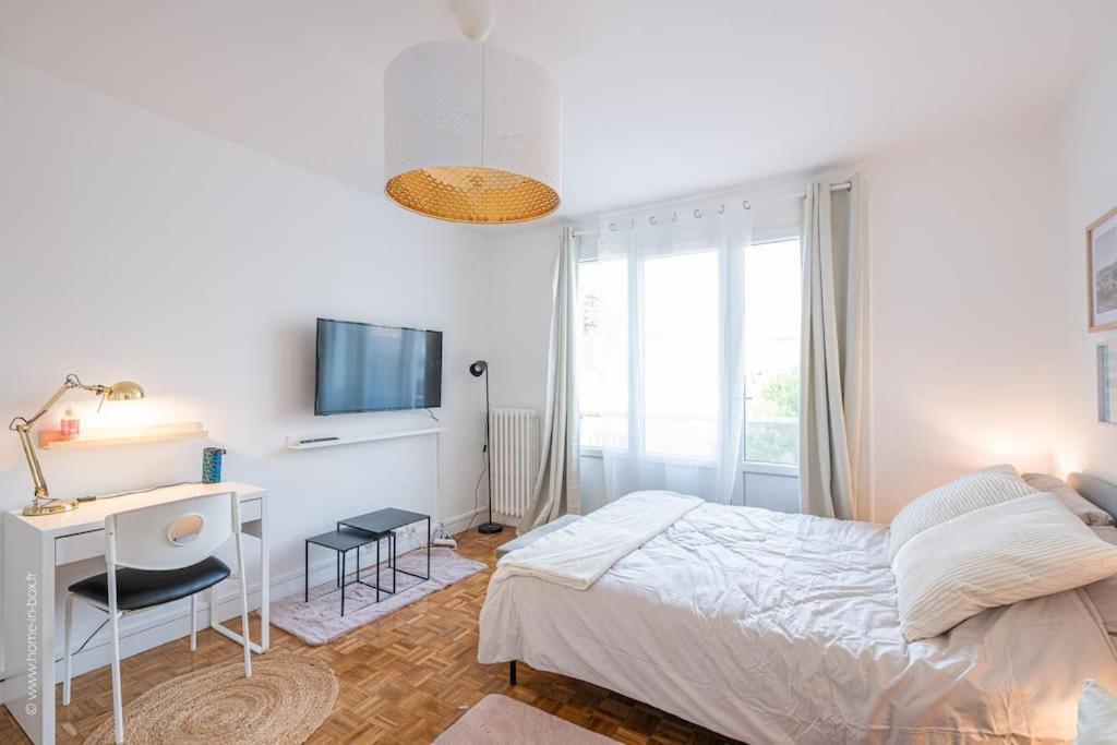 Appartement Suresnes : Appart cosy au pied de Paris La Defense Extérieur photo